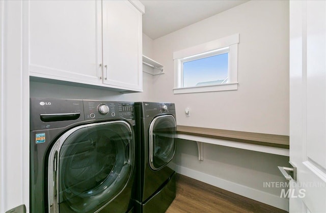 4603 S Hennessy Ave, Meridian, ID 83642 - washroom featuring washer and clothes dryer, cabinet space, and dark wood finished floors