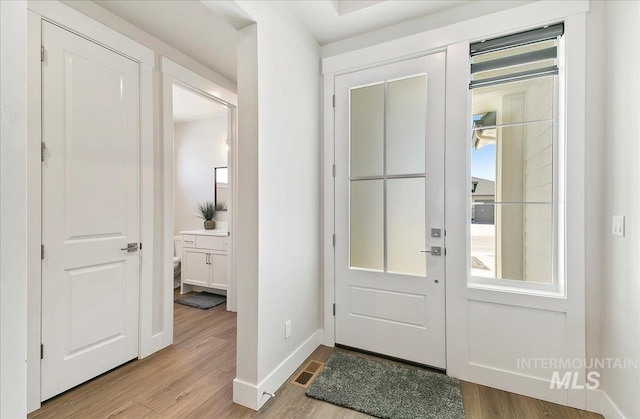 4603 S Hennessy Ave, Meridian, ID 83642 - entryway with wood finished floors and baseboards