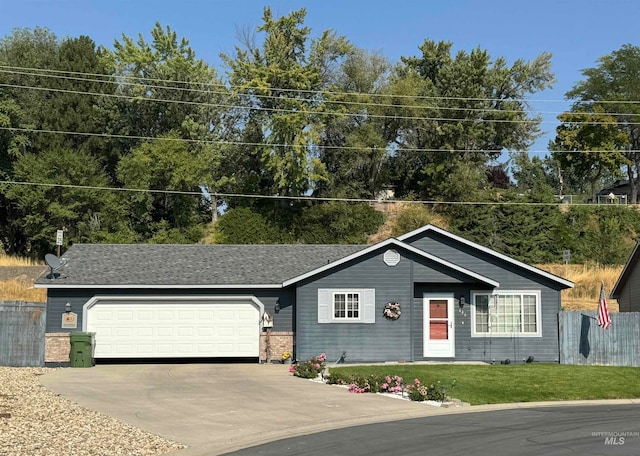 single story home with a garage and a front yard