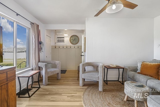1138 Normal Ave, Burley, ID 83318 - living room featuring light wood finished floors and a ceiling fan
