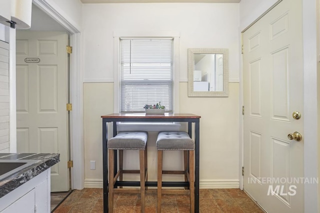 1138 Normal Ave, Burley, ID 83318 - dining room with baseboards and dark stone finish flooring