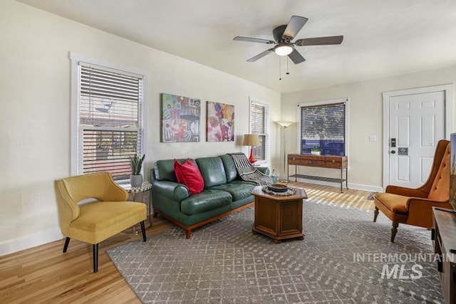1138 Normal Ave, Burley, ID 83318 - living room featuring baseboards, wood finished floors, and ceiling fan