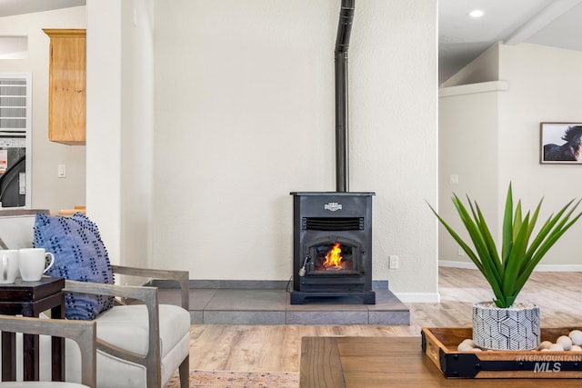 315 Bard Ave, Middleton, ID 83644 - living room with a wood stove, wood finished floors, baseboards, and recessed lighting