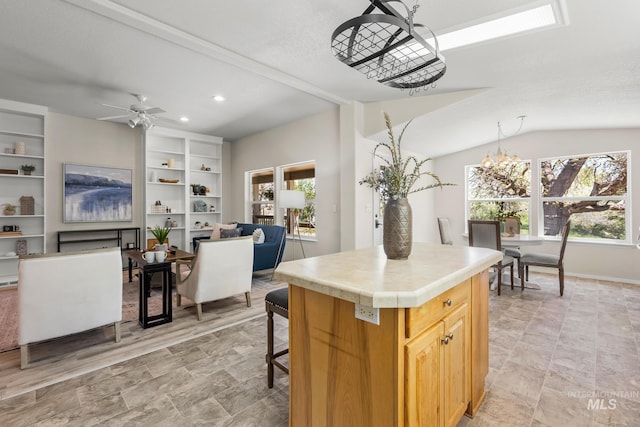 315 Bard Ave, Middleton, ID 83644 - kitchen with plenty of natural light, a ceiling fan, a kitchen island, recessed lighting, and open floor plan
