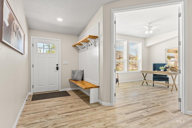 315 Bard Ave, Middleton, ID 83644 - mudroom with a textured ceiling, light wood-style floors, baseboards, and a ceiling fan