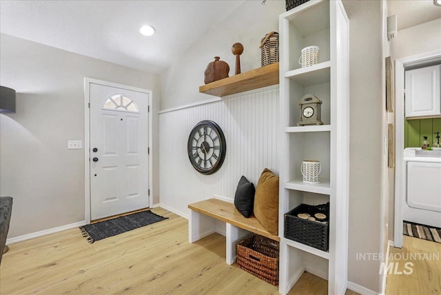 1827 Targhee Dr, Twin Falls, ID 83301 - mudroom with light wood-style flooring, built in features, and washer / dryer