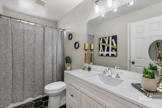 1827 Targhee Dr, Twin Falls, ID 83301 - full bathroom featuring vanity, tile patterned floors, and curtained shower