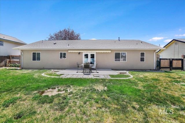 1827 Targhee Dr, Twin Falls, ID 83301 - rear view of house featuring a patio area, a gate, and stucco siding