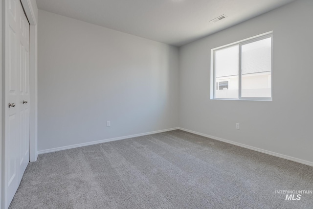 11922 W Box Canyon St, Star, ID 83669 - empty room featuring carpet floors and baseboards