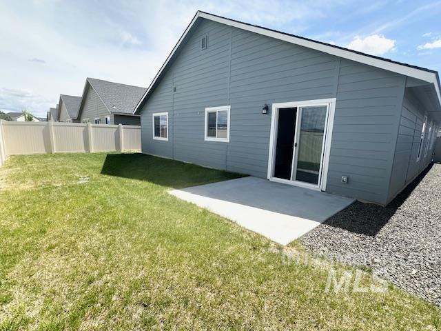 11922 W Box Canyon St, Star, ID 83669 - rear view of house with a patio area