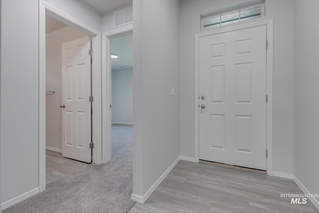 11922 W Box Canyon St, Star, ID 83669 - entryway with wood finished floors and baseboards