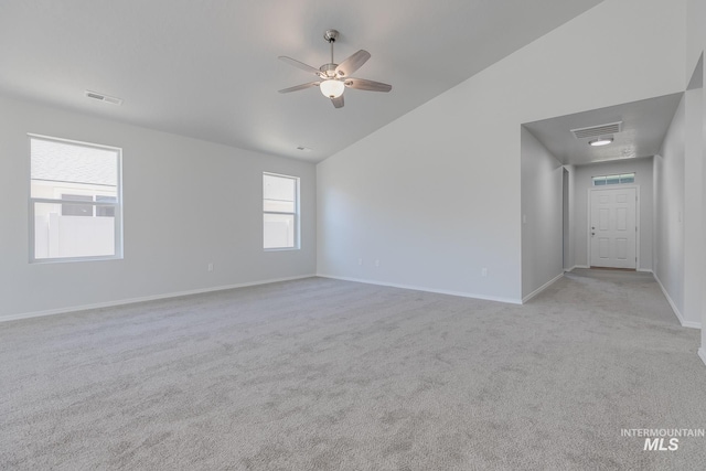 11922 W Box Canyon St, Star, ID 83669 - spare room featuring lofted ceiling, a ceiling fan, light carpet, and baseboards
