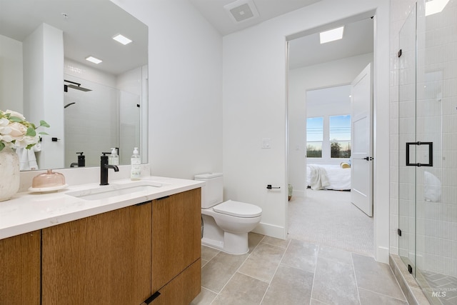 55 E State St Unit 303, Eagle, ID 83616 - bathroom featuring toilet, walk in shower, and vanity