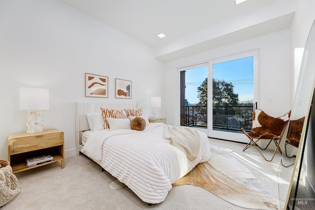 55 E State St Unit 303, Eagle, ID 83616 - bedroom featuring lofted ceiling, access to exterior, and carpet
