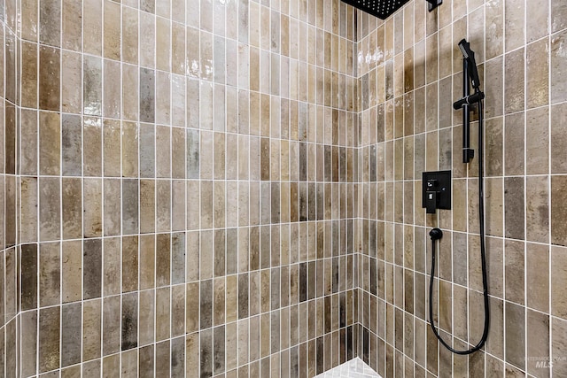 55 E State St Unit 303, Eagle, ID 83616 - bathroom featuring a tile shower