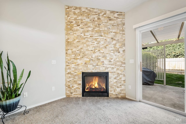 3189 S Kramer Ln, Boise, ID 83706 - unfurnished living room with baseboards, a fireplace, and carpet flooring
