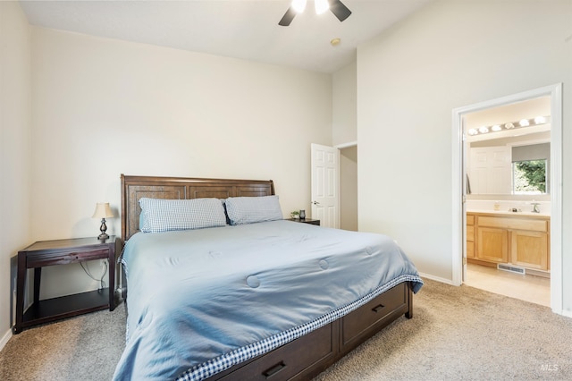 3189 S Kramer Ln, Boise, ID 83706 - bedroom with ceiling fan, visible vents, baseboards, ensuite bathroom, and light carpet