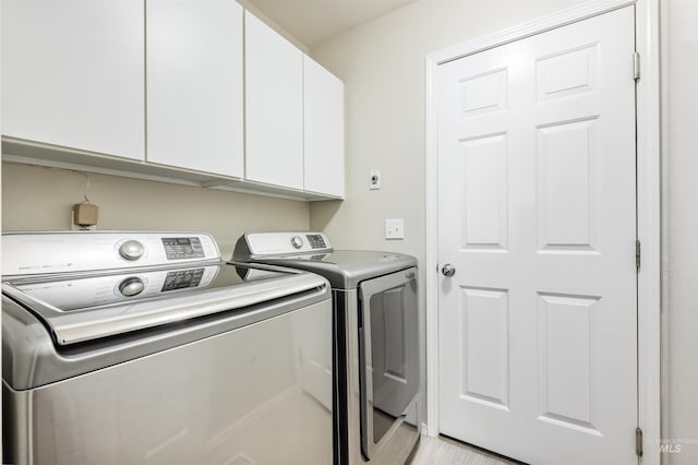 3189 S Kramer Ln, Boise, ID 83706 - clothes washing area featuring cabinet space and washer and dryer