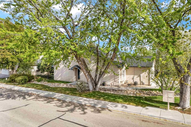 3189 S Kramer Ln, Boise, ID 83706 - obstructed view of property featuring stucco siding