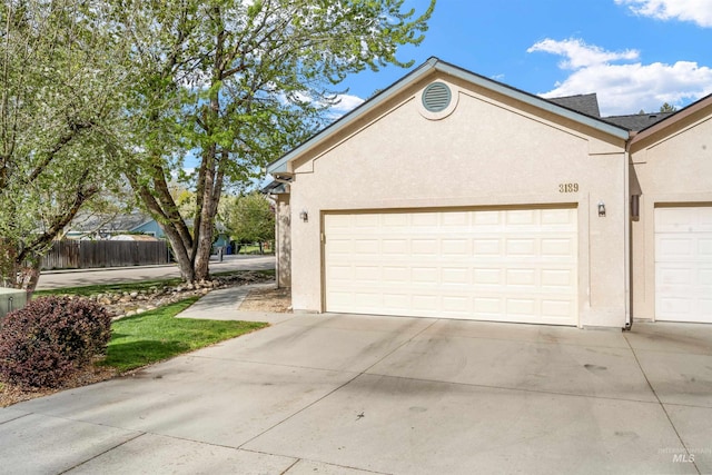 3189 S Kramer Ln, Boise, ID 83706 - garage with fence and driveway