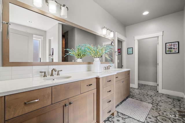 1315 N Luge Ave, Eagle, ID 83616 - full bathroom featuring double vanity, baseboards, backsplash, and recessed lighting