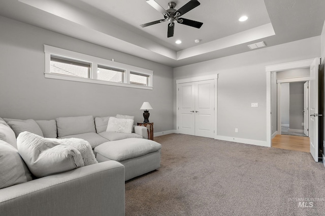 1315 N Luge Ave, Eagle, ID 83616 - living area featuring ceiling fan, baseboards, light carpet, recessed lighting, and a tray ceiling