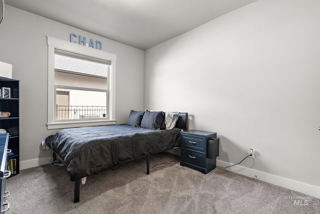 1315 N Luge Ave, Eagle, ID 83616 - bedroom with carpet floors and baseboards