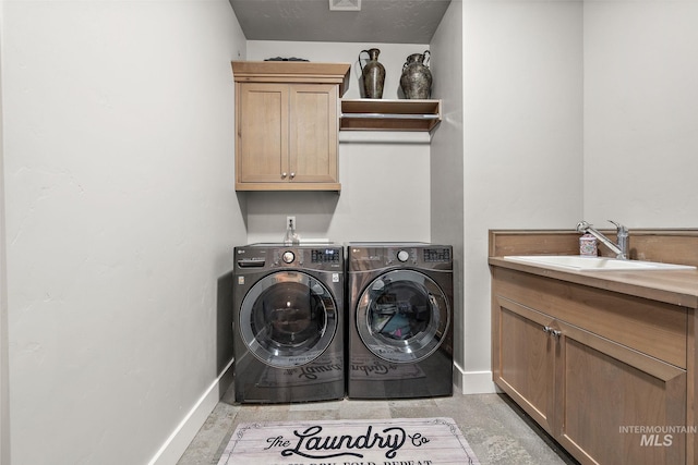 1315 N Luge Ave, Eagle, ID 83616 - washroom featuring baseboards, cabinet space, and separate washer and dryer