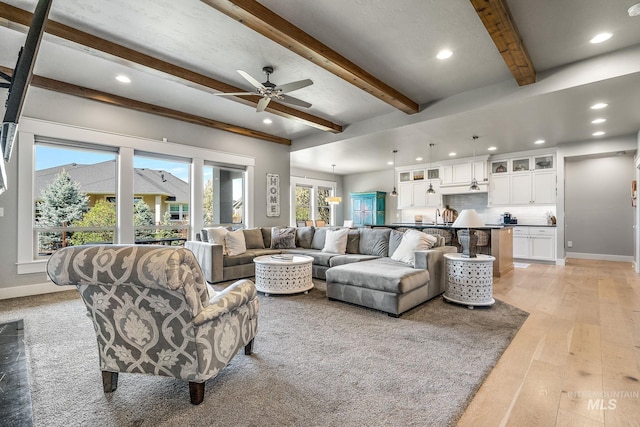 1315 N Luge Ave, Eagle, ID 83616 - living area featuring recessed lighting, a ceiling fan, beam ceiling, baseboards, and light wood-style floors