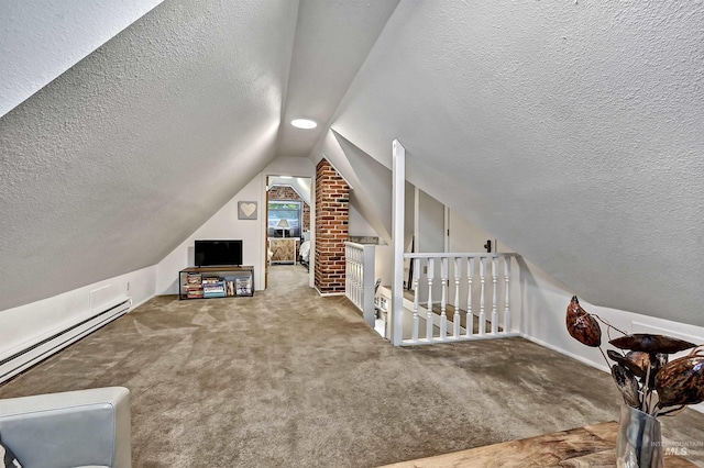 913 N 22nd St, Boise, ID 83702 - bonus room with a baseboard heating unit, a textured ceiling, carpet, and lofted ceiling