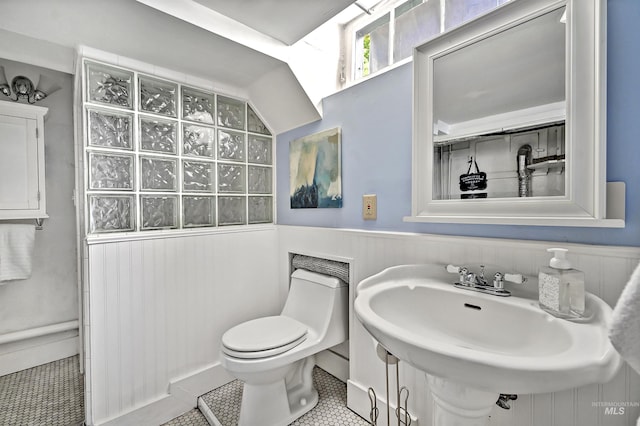 913 N 22nd St, Boise, ID 83702 - bathroom with toilet, a sink, wainscoting, and tile patterned floors