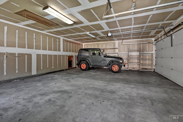 913 N 22nd St, Boise, ID 83702 - garage with a garage door opener