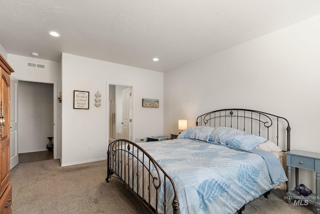 carpeted bedroom with recessed lighting, visible vents, and baseboards