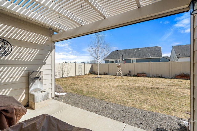 view of yard featuring a fenced backyard and a pergola