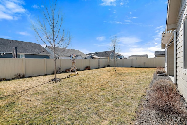 view of yard featuring a fenced backyard