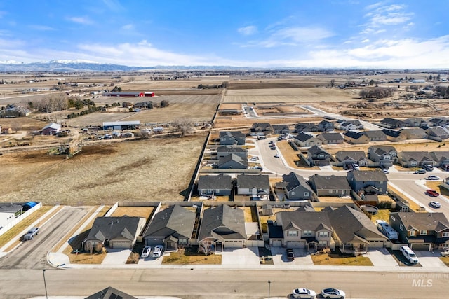 birds eye view of property with a residential view