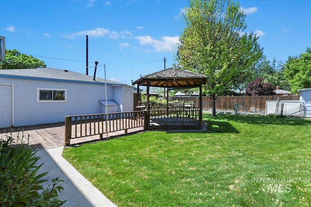 view of yard with a gazebo and a deck