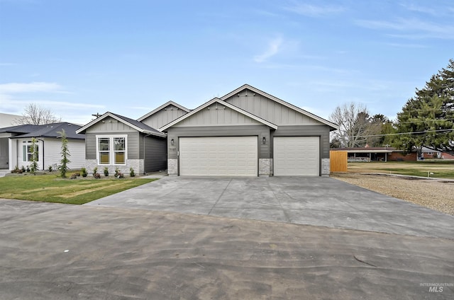 view of front facade featuring board and batten siding, concrete driveway, a garage, and a front yard