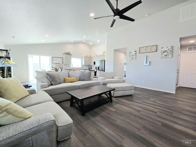 19339 Susquehanna Way, Caldwell, ID 83605 - living area featuring ceiling fan, dark wood finished floors, recessed lighting, high vaulted ceiling, and baseboards