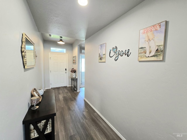 19339 Susquehanna Way, Caldwell, ID 83605 - hall with dark wood-style flooring and baseboards