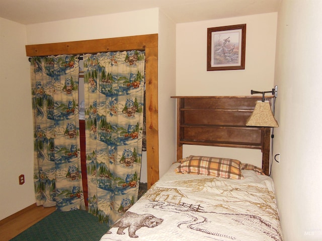 3695 W Mountain Rd, Anatone, WA 99401 - bedroom featuring wood finished floors