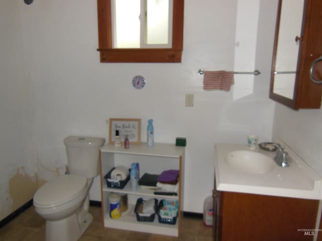 3695 W Mountain Rd, Anatone, WA 99401 - bathroom with vanity and toilet