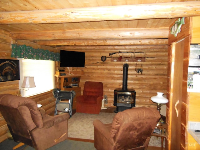3695 W Mountain Rd, Anatone, WA 99401 - living area with wooden ceiling, a wood stove, log walls, and beam ceiling
