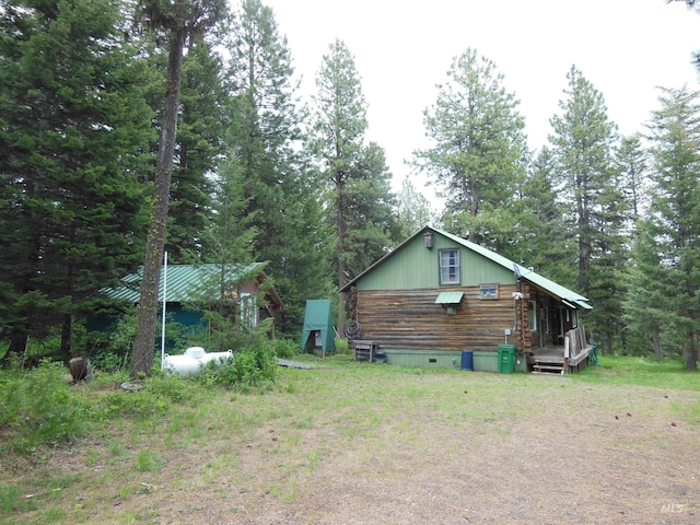 3695 W Mountain Rd, Anatone, WA 99401 - view of property exterior with log exterior and a forest view