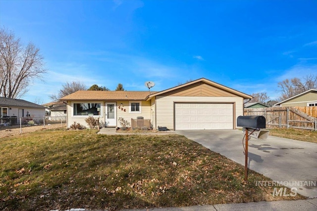 ranch-style house featuring a front lawn and a garage