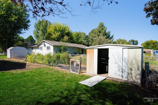 view of outbuilding with a lawn