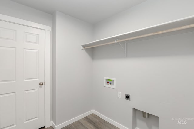laundry room featuring baseboards, washer hookup, laundry area, dark wood-style floors, and electric dryer hookup