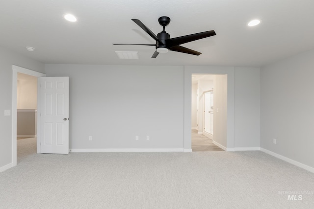 unfurnished room featuring baseboards, recessed lighting, light carpet, and ceiling fan