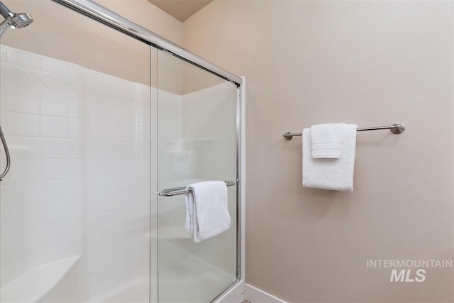 2479 N Devlin Ave, Meridian, ID 83646 - full bath featuring a shower stall and baseboards
