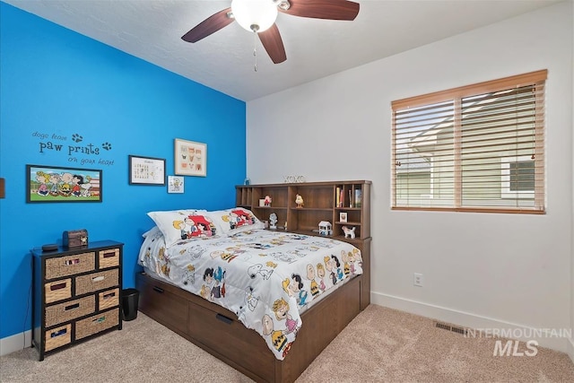 2479 N Devlin Ave, Meridian, ID 83646 - bedroom with carpet floors, baseboards, and ceiling fan